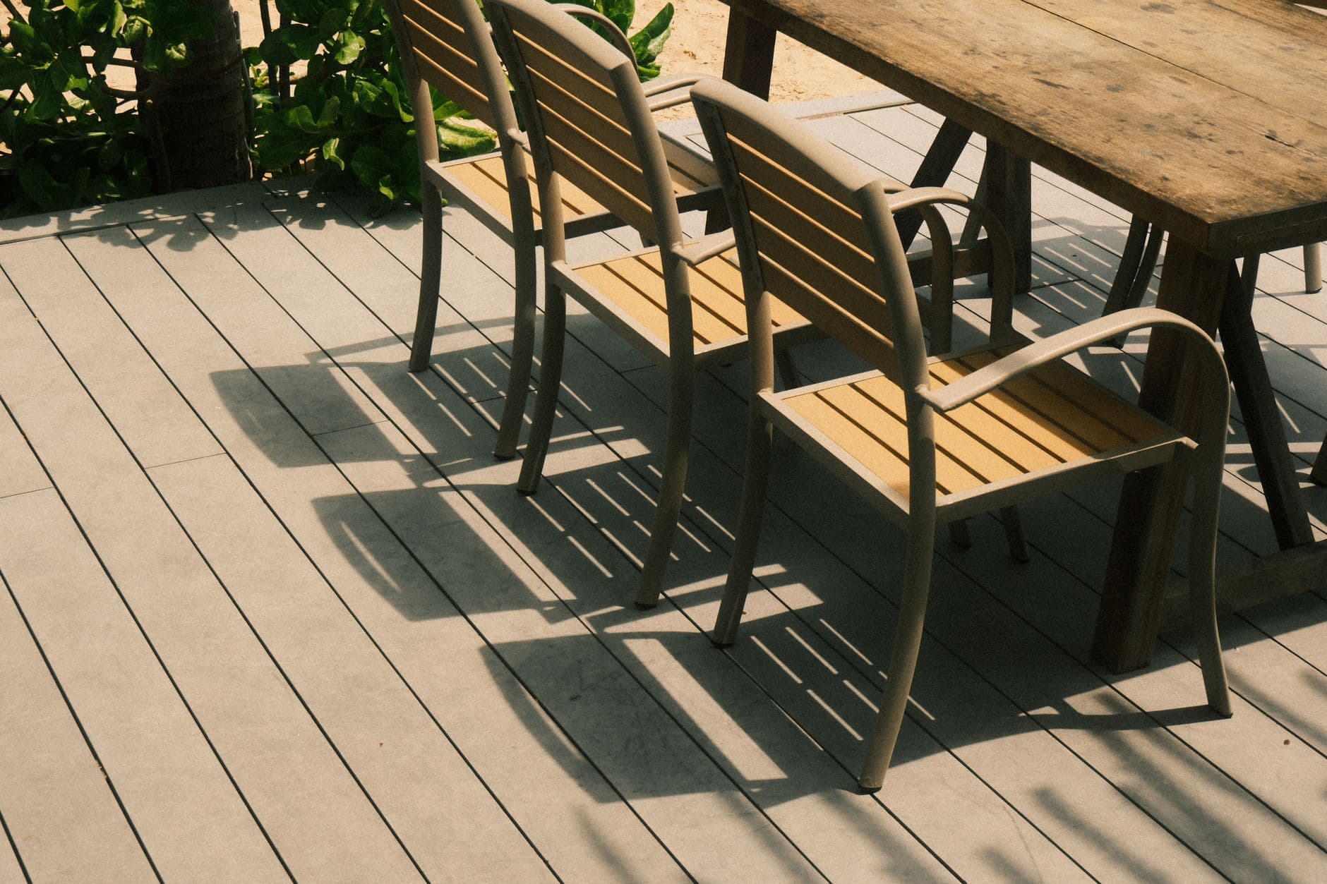 Deck staining by Bing's Painting Plus in Ocala, FL — restored wood deck with rich stain finish